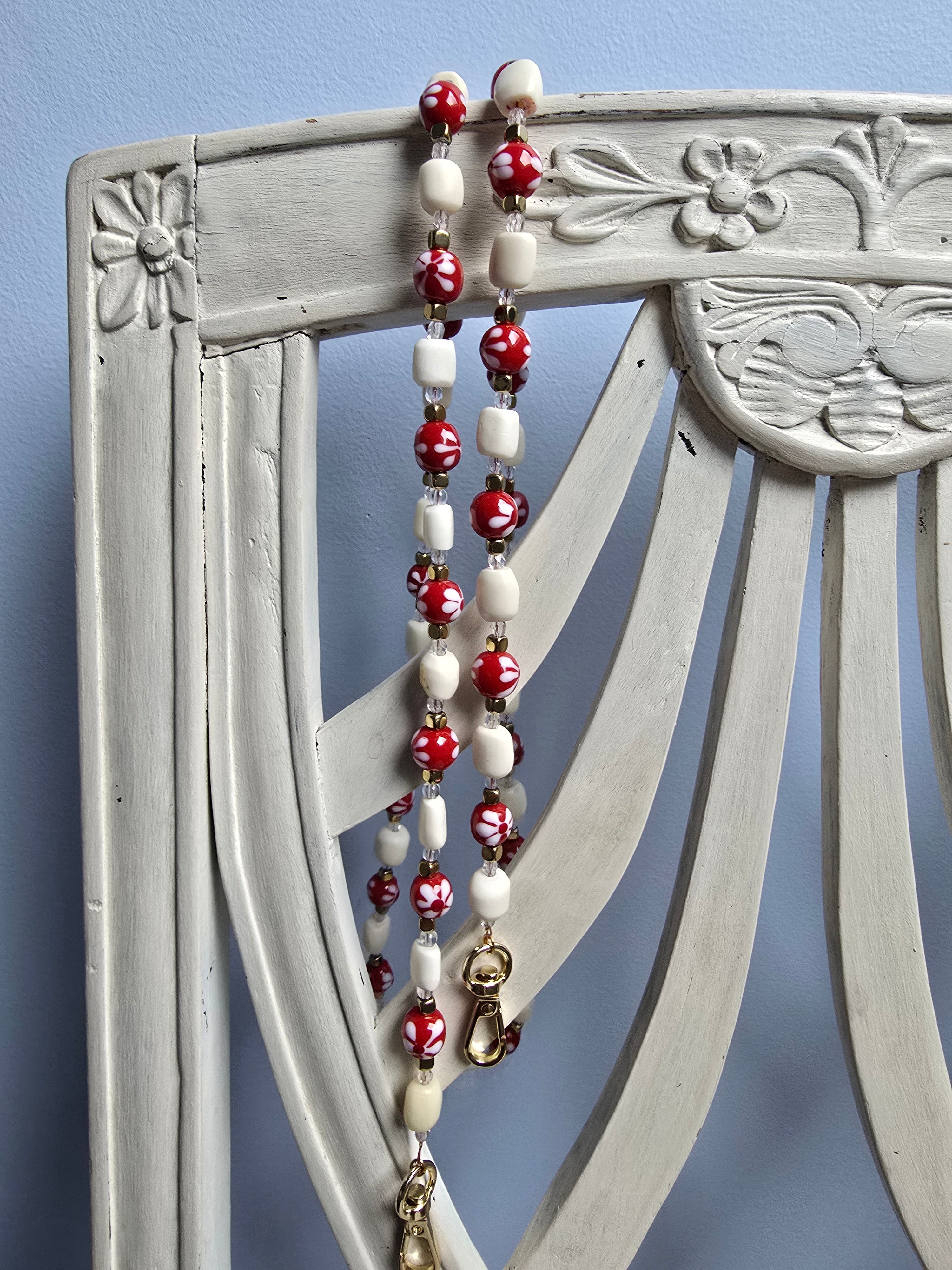 Bandoulière Rosa en Corne et perles dans les tons du Rouge