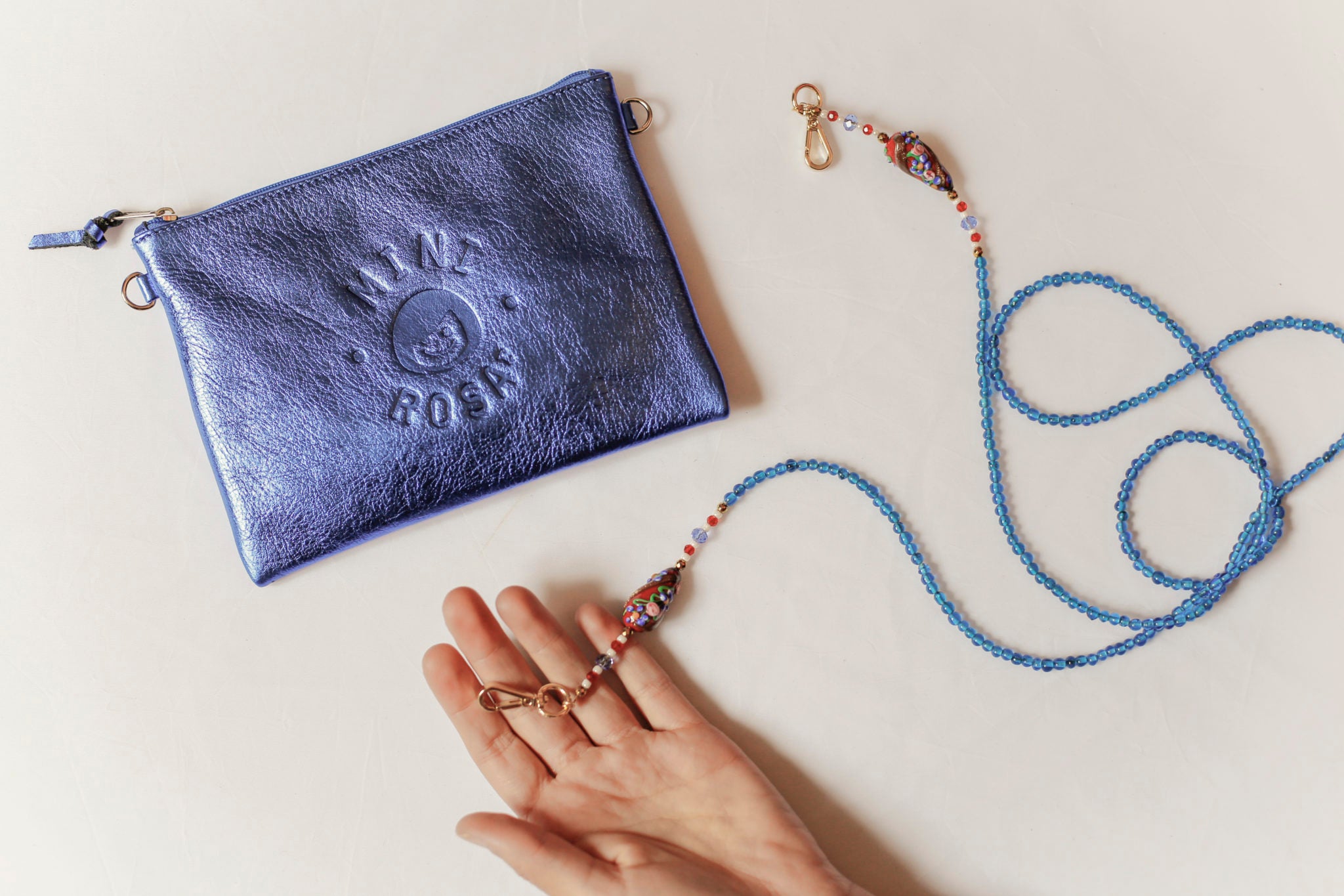Elégante et pratique pochette en cuir à accorder avec les bandoulières MiniRosa